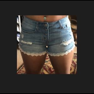 Jean shorts with lace trim